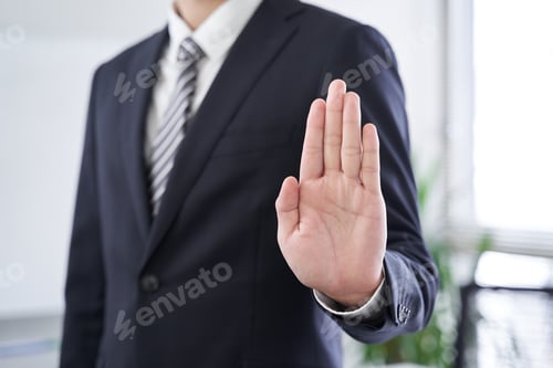 Preview: A Japanese male businessman standing still in a conference room for text synthesis