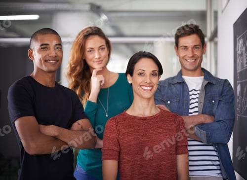 Preview: Cropped portrait of a team of young creative professionals standing in the office