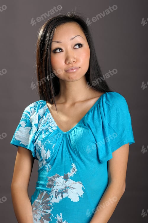 Preview: Portrait Of Cute Female Fashion Model Posing On Dark Background