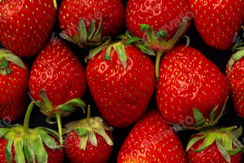 Preview: Red ripe fresh strawberry with leaves close up