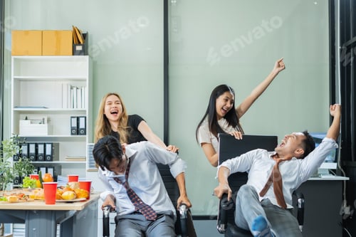 Preview: Celebration successful deal and pizza in the workplace.