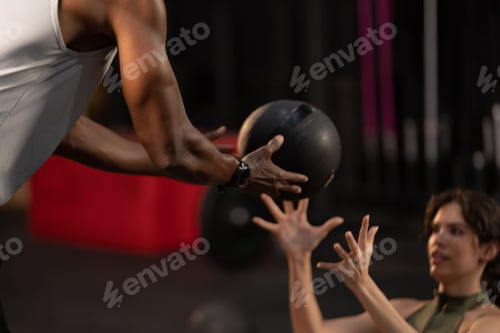 Preview: Young male and female and a fitness couple in sportswear working out in modern gym
