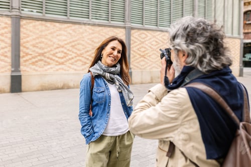 Preview: Senior adult man taking pictures to her wife during summer vacation