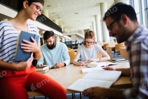 Preview: Group of college students studying