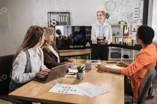 Preview: Multiracial female business people having briefing about financial situation at company.
