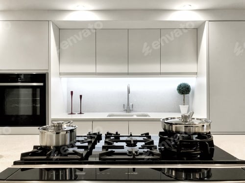 Preview: A clean and modern kitchen interior with range cooker and sterile appearance