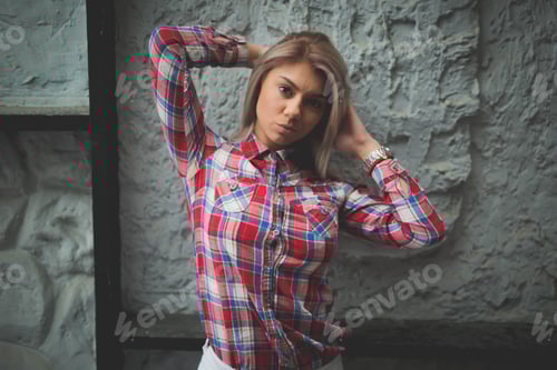 Preview: Stylish Woman Posing in a Plaid Shirt
