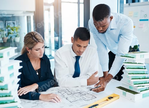 Preview: Designers and architects working on construction plan, planning with blueprint paperwork and talkin