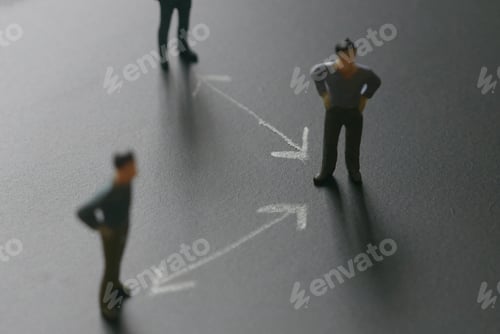 Preview: Selective focus of miniature people on a chalkboard with white arrow represent social distance of