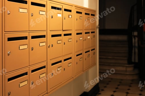 Preview: Many metal mailboxes with keyholes at post office