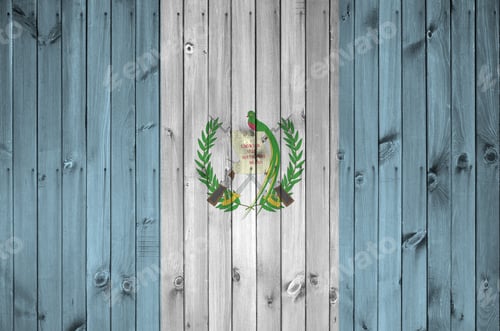 Preview: Guatemala flag depicted in bright paint colors on old wooden wall close up