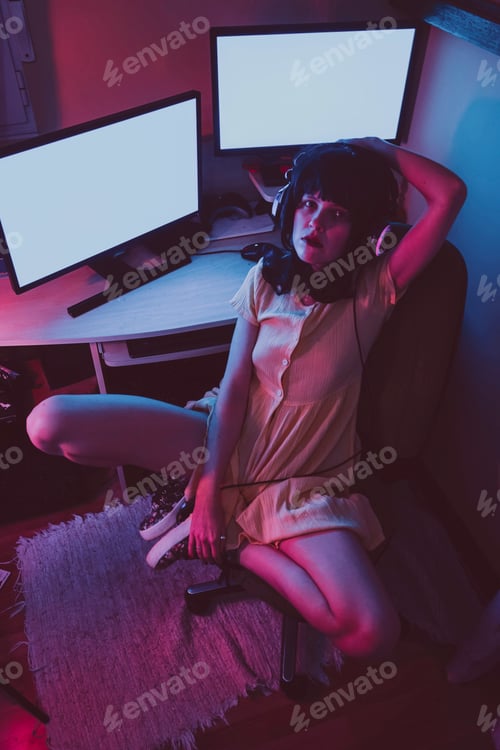 Preview: Young streamer woman working at night from home