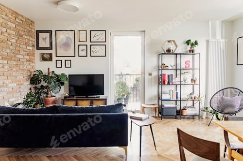 Preview: Stylish scandinavian living room open space with design sofa and bookstand.