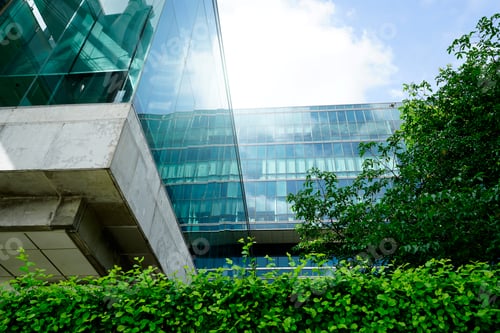 Preview: Sustainble green building. Eco-friendly building in modern city. Sustainable glass office building