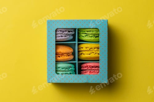 Preview: a top view of the french sweet desert - macaroons in the cardboard box