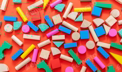 Preview: Wooden colorful blocks on red color background