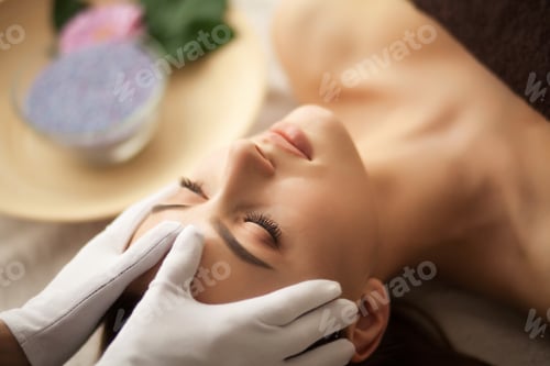 Preview: Spa. Beautiful Young Woman Getting a Face Treatment at Beauty Salon