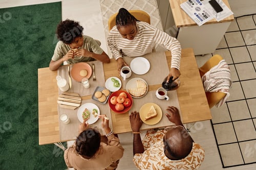 Preview: Black Family Having Breakfast at Home