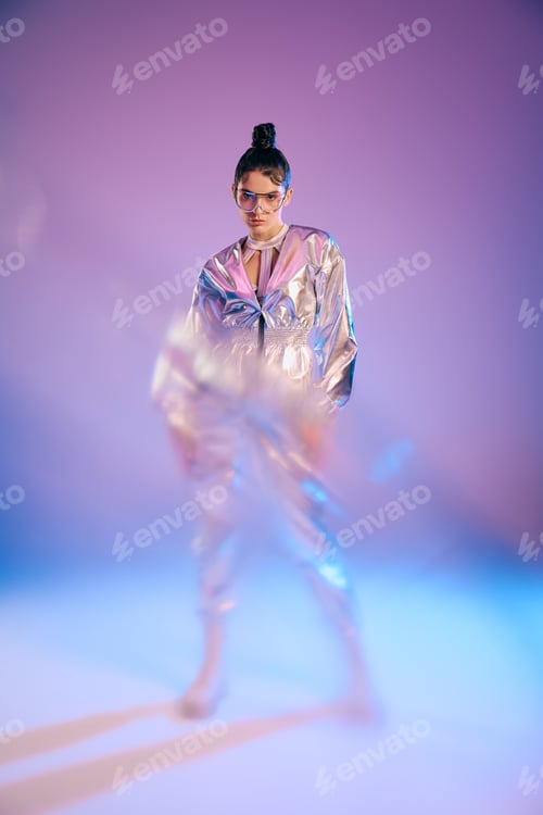 Preview: Stylish woman showcases holographic fashion in a vibrant futuristic setting with a modern flair