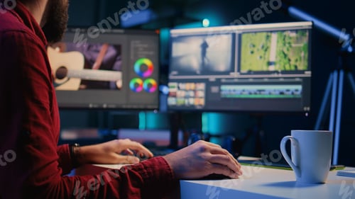 Preview: Video editor arranging recorded stock clips into seamless whole in creative multimedia agency