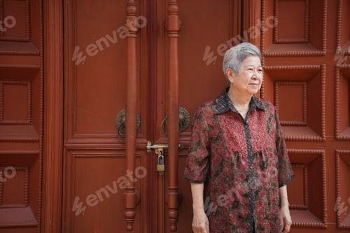 Preview: asian old elder woman elderly female relaxing resting on balcony terrace. senior leisure lifestyle