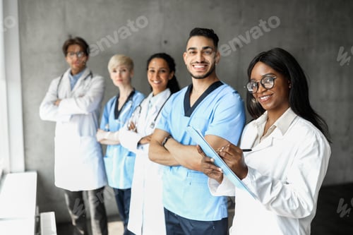 Preview: International team of doctors having morning breefing