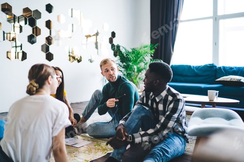 Preview: Diverse friends gathering together at home talking about new project