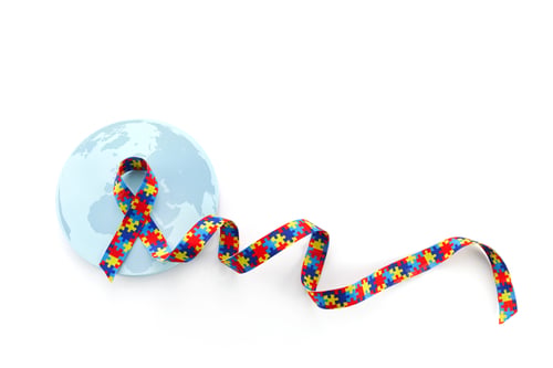 Preview: World Autism awareness and pride day or month with Puzzle pattern ribbon on white background