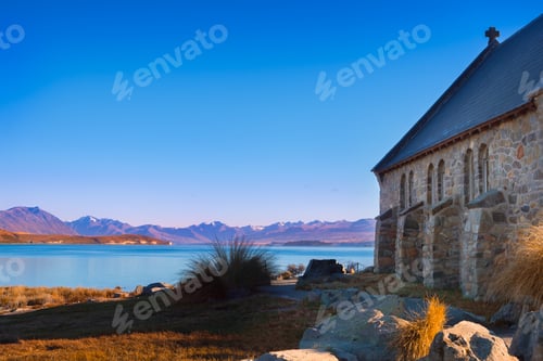 Preview: Colorful autumn view of Lake Tekapo with Church of good shepherd