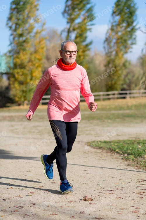 Preview: Senior retired man runs and performs exercise