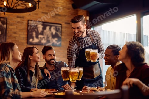 Preview: Group of happy friends having fun while waiter is serving them beer in a pub.
