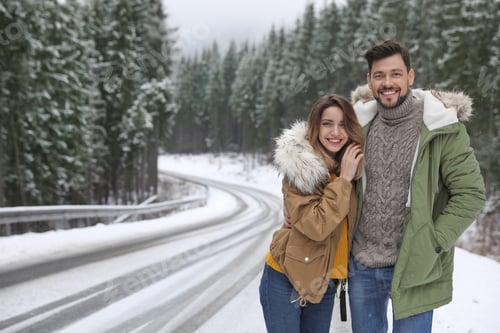 Preview: Couple walking near snowy forest, space for text. Winter vacation