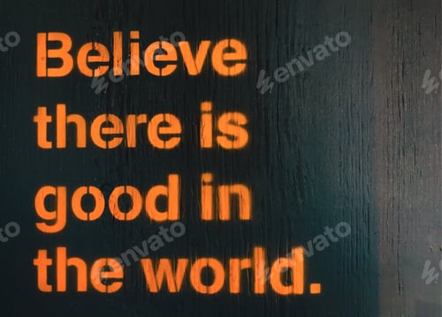 Preview: Believe there is good in the world painted on a wooden wall for inspiration