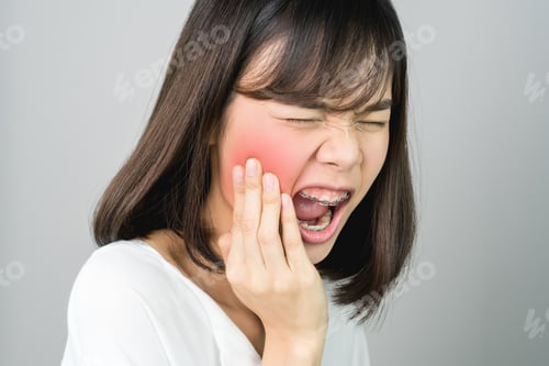 Preview: Asian girl in white casual dress Show off the toothache