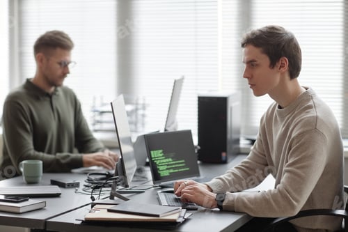 Preview: Focused Programmer Developing Cybersecurity Software