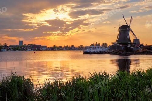 Preview: Windmills at Zaanse Schans in Holland on sunset. Zaandam, Nether