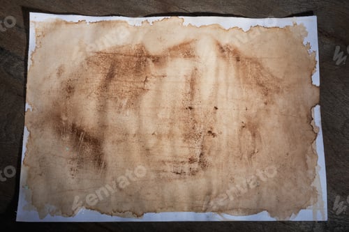 Preview: Sheet Of Paper With The Effect Of Aging On Dark Wooden Background.