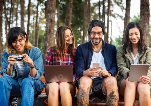 Preview: Friends Using Digital Device Outdoors Concept