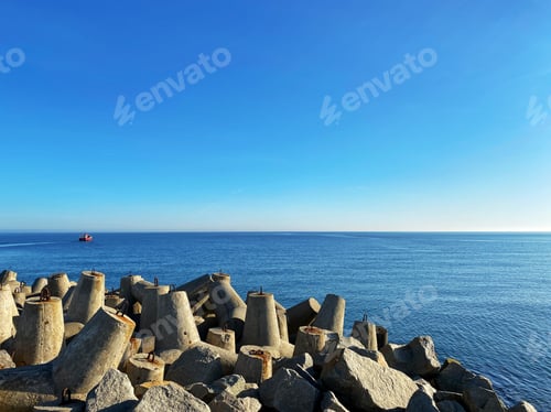 Preview: Concrete breakwater on a beach