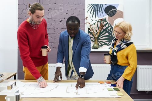 Preview: Group of architects working with project