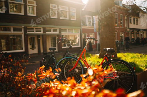Preview: Old bike on the streets of Amsterdam. Beautiful sunny day, spring time. The concept of travel.