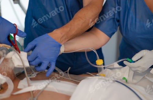 Preview: Medical team caring for patient in intensive care unit