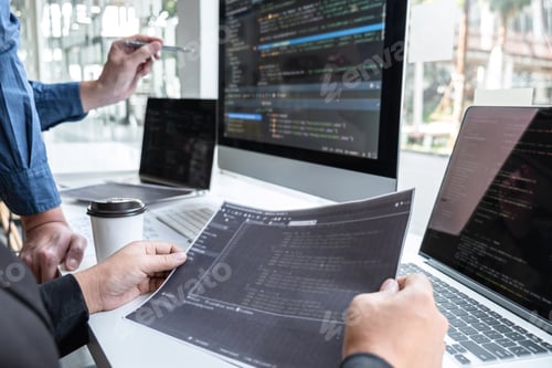 Preview: Team of developer programmer working on project in software development computer in IT company