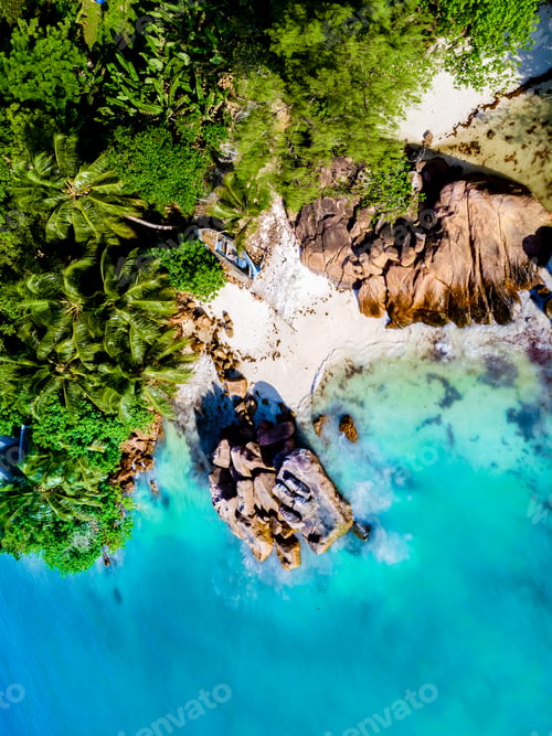 Preview: Drone view from above at a tropical beach in the Seychelles, Anse Volbert beach Praslin