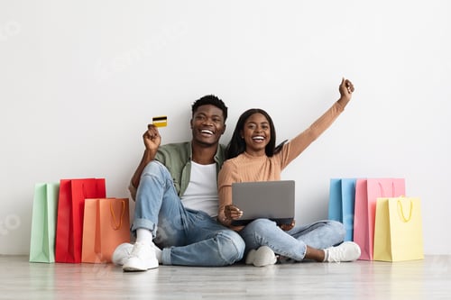 Preview: Emotional black family buying stuff online for their apartment