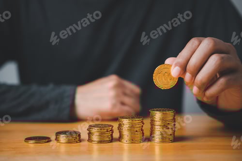 Preview: Stacks of Coins Symbolize Growth and Investments