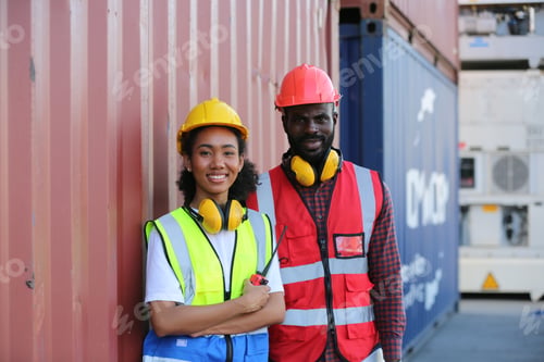 Preview: Foreman control loading Containers box from Cargo freight ship for import export.