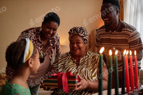 Preview: Family Giving Present to Girl