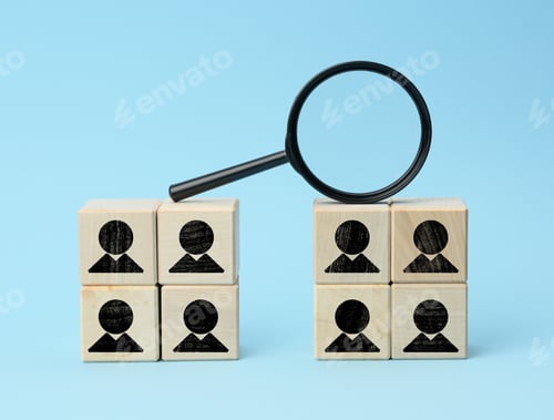 Preview: Wooden cubes with staff black magnifier on blue background