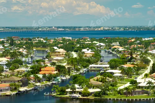 Preview: Aerial view of rural private houses in remote suburbs located on sea coast near Florida